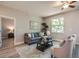Comfortable living room with ceiling fan, natural light, and stylish decor at 0 Paddock St, Orlando, FL 32833