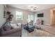 Inviting living room with neutral tones, ample natural light, and a comfortable seating arrangement at 0 Paddock St, Orlando, FL 32833