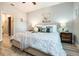 Comfortable main bedroom featuring soft textures, ambient lighting, and stylish decor at 0 Paddock St, Orlando, FL 32833