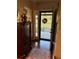 Bright and spacious entryway with hardwood floors and charming decor at 12680 Sw 98Th St, Dunnellon, FL 34432