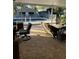 Covered patio overlooking a refreshing pool and spacious backyard at 12680 Sw 98Th St, Dunnellon, FL 34432