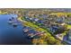 Aerial shot of waterfront community showcasing lakefront homes with private docks at 16659 Broadwater Ave, Winter Garden, FL 34787