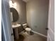 Powder room featuring pedestal sink and toilet with tile floors at 5318 Center Lake Ranch Blvd, St Cloud, FL 34771