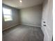 Neutral bedroom with carpet, a window offering natural light, and closet with door on the right at 5318 Center Lake Ranch Blvd, St Cloud, FL 34771