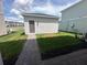 Detached garage with walkway at rear of property at 5318 Center Lake Ranch Blvd, St Cloud, FL 34771