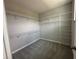 Spacious walk-in closet with shelving, providing ample storage for clothing and accessories at 5318 Center Lake Ranch Blvd, St Cloud, FL 34771
