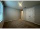 Bright bedroom features neutral walls, carpet and closet with double doors at 5379 Park Guell St, St Cloud, FL 34771