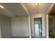 Spacious foyer with tile floors and neutral walls welcomes you into the home at 5385 Park Guell St, St Cloud, FL 34771