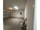 Spacious unfinished garage with high ceilings and an overhead door opener at 5385 Park Guell St, St Cloud, FL 34771