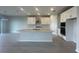 Spacious kitchen with a large center island, modern appliances, and ample cabinet space at 5385 Park Guell St, St Cloud, FL 34771