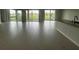 Open living area with sliding glass doors and tile floors provides seamless indoor-outdoor living at 5385 Park Guell St, St Cloud, FL 34771