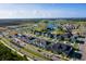 New townhomes in a Gathering-friendly community with ponds and landscaping at 7916 Waterfield Ave, Orlando, FL 32832