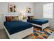 Charming bedroom with two twin beds, colorful accents, and matching decor creating a cozy atmosphere at 7916 Waterfield Ave, Orlando, FL 32832
