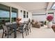 Relaxing outdoor patio with dining and lounge areas, perfect for entertaining and enjoying the view at 7916 Waterfield Ave, Orlando, FL 32832