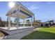 Outdoor pavilion with modern design, offering a shady and inviting space for community gatherings and relaxation at 7916 Waterfield Ave, Orlando, FL 32832