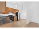 Eat-in kitchen with light wood cabinets, stainless steel appliances, and tile flooring at 916 Derbyshire Dr, Kissimmee, FL 34758