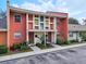 Charming multi-Gathering home featuring vibrant coral exteriors, colorful accents, and well-maintained landscaping at 4786 Tangerine Ave # 4786, Winter Park, FL 32792