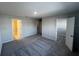 Spacious room featuring plush carpeting, and access to bathroom and walk-in closet with neutral paint and recessed lighting at 5086 Rain Shadow Dr, St Cloud, FL 34772