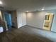 Spacious room featuring plush carpeting, and access to bathroom with neutral paint and recessed lighting at 5086 Rain Shadow Dr, St Cloud, FL 34772