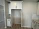 Open-concept kitchen featuring white cabinets and modern appliances at 5086 Rain Shadow Dr, St Cloud, FL 34772
