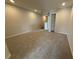 Cozy loft area with soft carpeting and plenty of natural light at 5086 Rain Shadow Dr, St Cloud, FL 34772