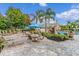 Poolside patio with plenty of seating available at 12843 Madison Pointe Cir # 107, Orlando, FL 32821