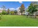 Spacious community volleyball court with a picnic bench at 12843 Madison Pointe Cir # 107, Orlando, FL 32821