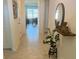 Bright and spacious entryway with tile flooring, leading to living areas at 2243 Tay Wes Dr, Saint Cloud, FL 34771