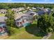 Aerial view of house with pool and landscaping at 9918 Turtle Bay Ct, Orlando, FL 32832