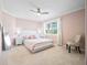 Bedroom with bright natural light and ceiling fan at 9918 Turtle Bay Ct, Orlando, FL 32832