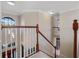 Foyer with a staircase and plenty of natural light, offering a grand entrance to the home at 9918 Turtle Bay Ct, Orlando, FL 32832