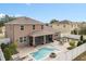 Aerial view of two-story house with pool and fenced backyard at 1316 Fountain Hills Ct, Winter Park, FL 32792