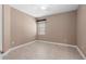 Simple bedroom with tile flooring and neutral decor at 1316 Fountain Hills Ct, Winter Park, FL 32792