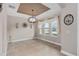 Elegant dining room with chandelier, crown molding, and large windows at 1316 Fountain Hills Ct, Winter Park, FL 32792