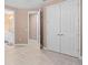 Bright hallway with tile flooring and access to bathroom at 1316 Fountain Hills Ct, Winter Park, FL 32792