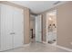 Hallway with double doors and access to another bathroom at 1316 Fountain Hills Ct, Winter Park, FL 32792