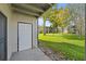 View from patio shows backyard and neighboring buildings at 134 Springwood Cir # E, Longwood, FL 32750