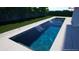 Relaxing rectangular pool with cascading water features at 1429 Chapman Cir, Winter Park, FL 32789