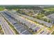 Expansive aerial view showcases this modern home's location within a well-planned community at 2736 Bookmark Dr, Kissimmee, FL 34746