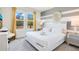 Comfortable bedroom featuring a plush bed, plenty of natural light, and stylish decor at 2736 Bookmark Dr, Kissimmee, FL 34746