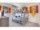 A kid themed bedroom with bunk beds and decor inspired by the Harry Potter movies at 2736 Bookmark Dr, Kissimmee, FL 34746