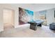 Spacious game room featuring a pool table and colorful coral reef mural at 2736 Bookmark Dr, Kissimmee, FL 34746