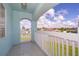 Covered balcony offering views of neighborhood at 51 Andora Ct, Kissimmee, FL 34758