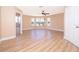 Main bedroom with wood-look floors and ensuite bath at 51 Andora Ct, Kissimmee, FL 34758