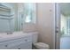 Bright bathroom featuring a vanity, toilet, and walk in shower at 519 Lakescape Ct, Orlando, FL 32828