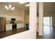 Spacious kitchen with stainless steel appliances, white cabinetry, and an open design at 519 Lakescape Ct, Orlando, FL 32828