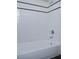 Shower with tiled walls and black accent stripe at 519 Lakescape Ct, Orlando, FL 32828