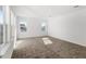 Spacious bonus room with ample natural light and neutral carpet at 10133 Peebles St, Orlando, FL 32827