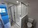 Bathroom with glass shower enclosure and white subway tile at 5084 Rain Shadow Dr, Saint Cloud, FL 34772