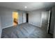 Neutral bedroom with carpet, a walk-in closet, and an ensuite bathroom at 5084 Rain Shadow Dr, Saint Cloud, FL 34772